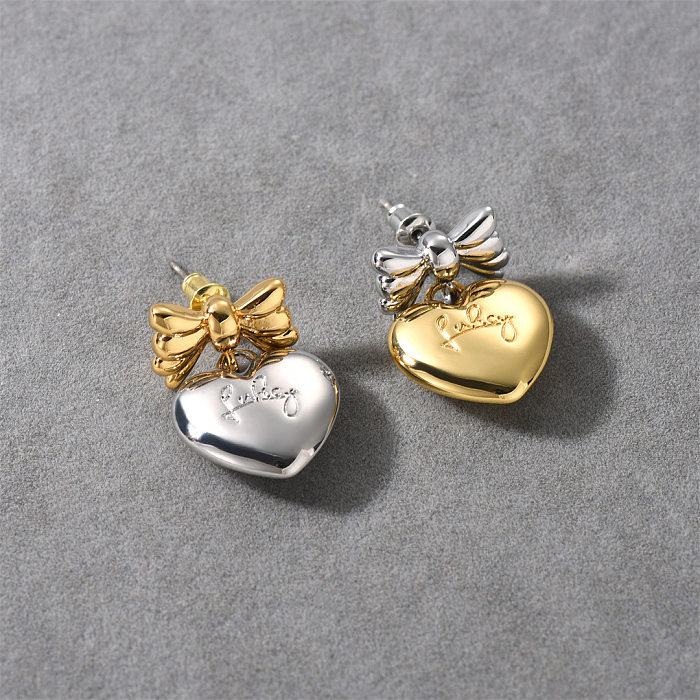 1 paire de boucles d'oreilles mignonnes en forme de cœur, nœud papillon plaqué en cuivre plaqué or 18 carats
