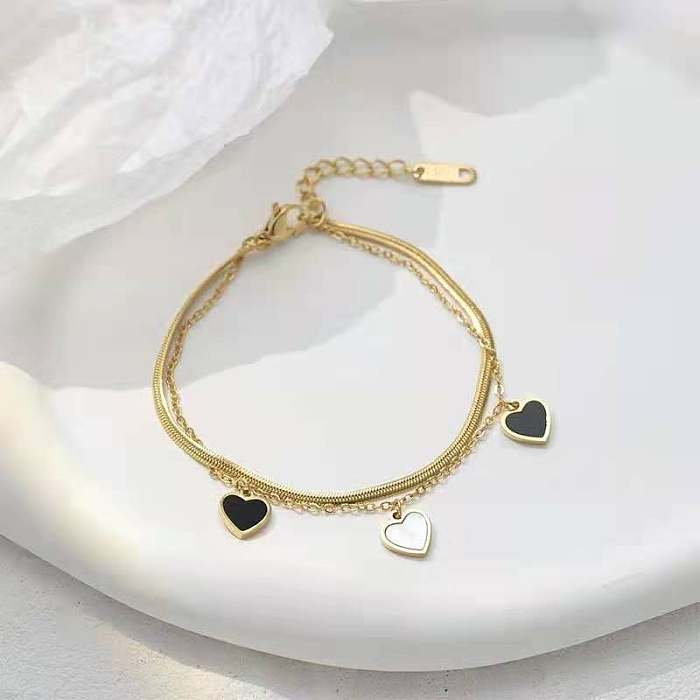 Conjunto de joias de chapeamento de aço de titânio arílico em formato de coração da moda 1 peça