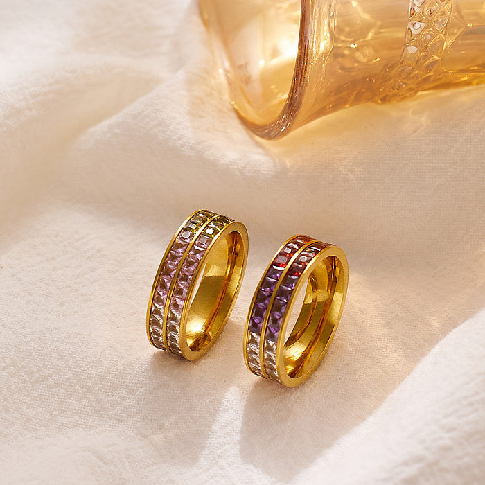 Pulseras de anillos chapadas en oro de 18 quilates con incrustaciones de acero de titanio redondo casual