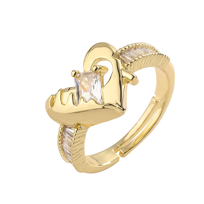 Luxuriöse offene Ringe in Bären-Herzform mit Kupferbeschichtung und Zirkon-Inlay