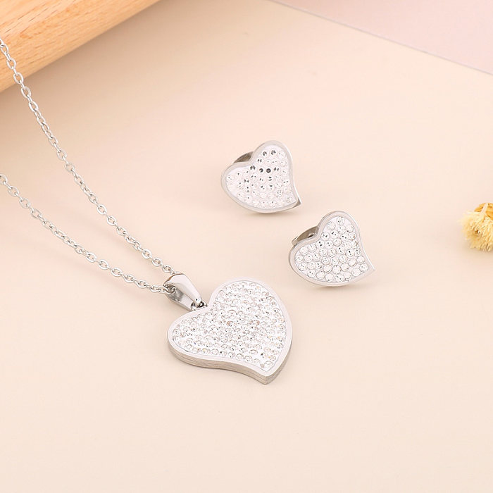 Conjunto de joias banhadas a ouro 18K em forma de coração brilhante estilo simples em titânio