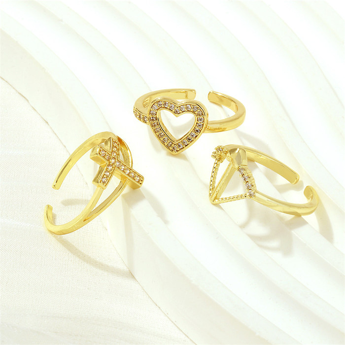 Estilo simples cruz forma de coração cauda de peixe chapeamento de cobre incrustação zircão 18K anéis abertos banhados a ouro