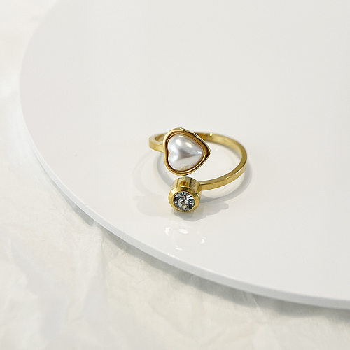 Anillo abierto de perla con incrustaciones de acero titanio en forma de corazón de moda de 1 pieza