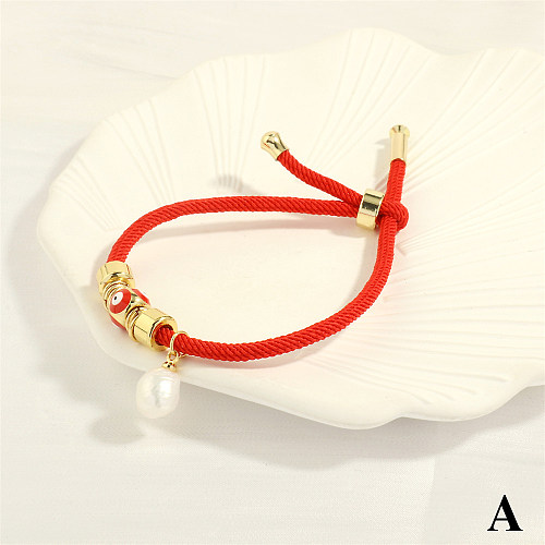 Retro Devil'S Eye Freshwater Pearl Copper Knitting Enamel Plating 18K Gold Plated Drawstring Bracelets