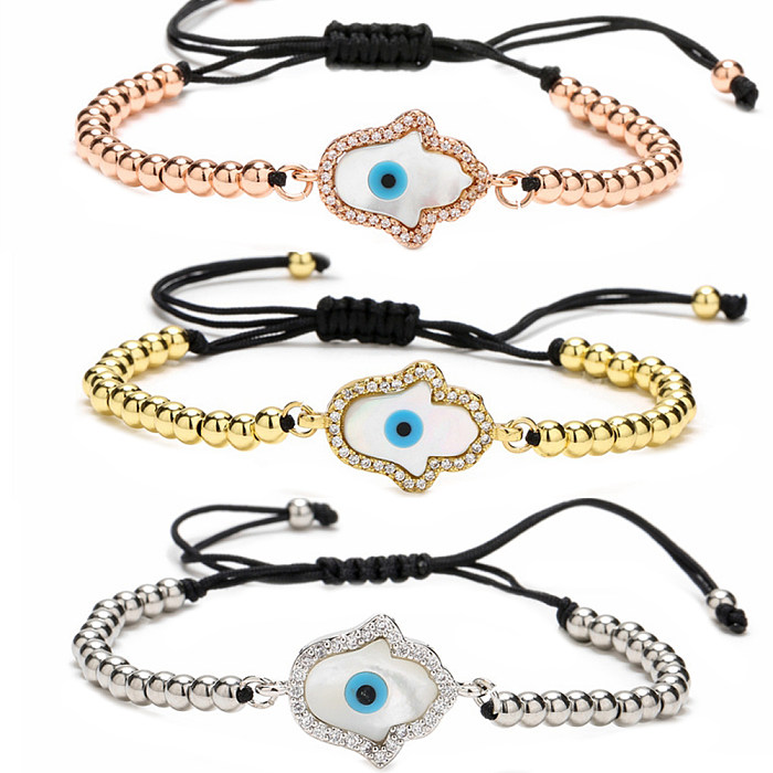 Luxuriöse Pendelarmbänder im klassischen Palm-Eye-Kupfer-Perlen-Inlay-Zirkon-Stil