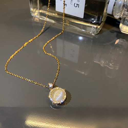 Collier pendentif opale incrusté de cuivre rond de style simple
