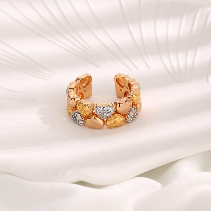 Glamouröser offener Ring in Herzform mit Kupferbeschichtung und Zirkoneinlage, 18 Karat vergoldet