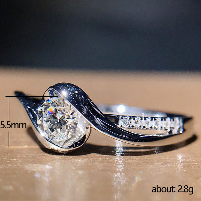 Mode kreative Twist eingelegte Pfeile Zirkon Kupfer Ring weiblich