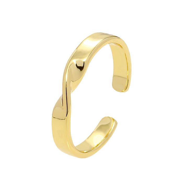 Elegante Retro-Streetwear-geometrische Bogenknoten-Kupferbeschichtungs-Inlay-Zirkon-vergoldete offene Ringe