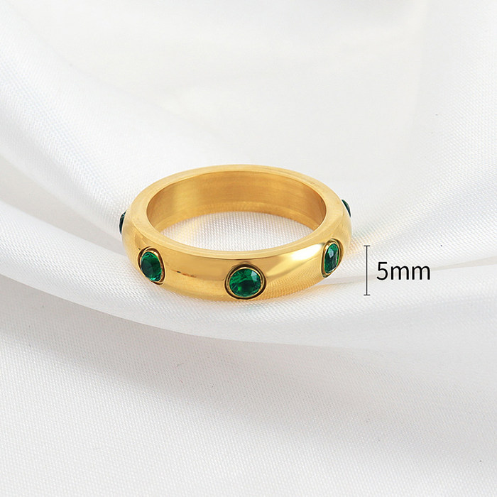 Elegante, klassische, runde Ringe aus Titanstahl mit polierter Beschichtung und Einlage aus 18 Karat vergoldeten Strasssteinen