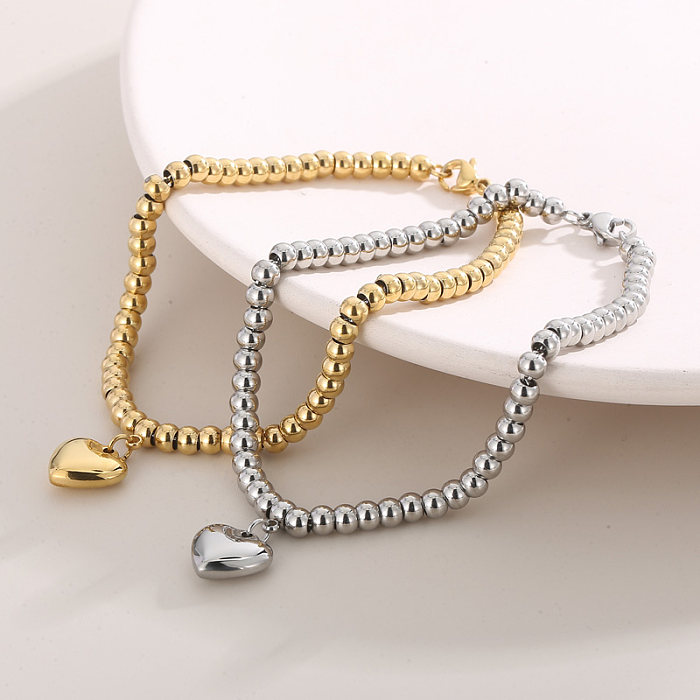 Estilo moderno formato de coração titânio aço banhado a ouro 18K pulseiras brincos colar