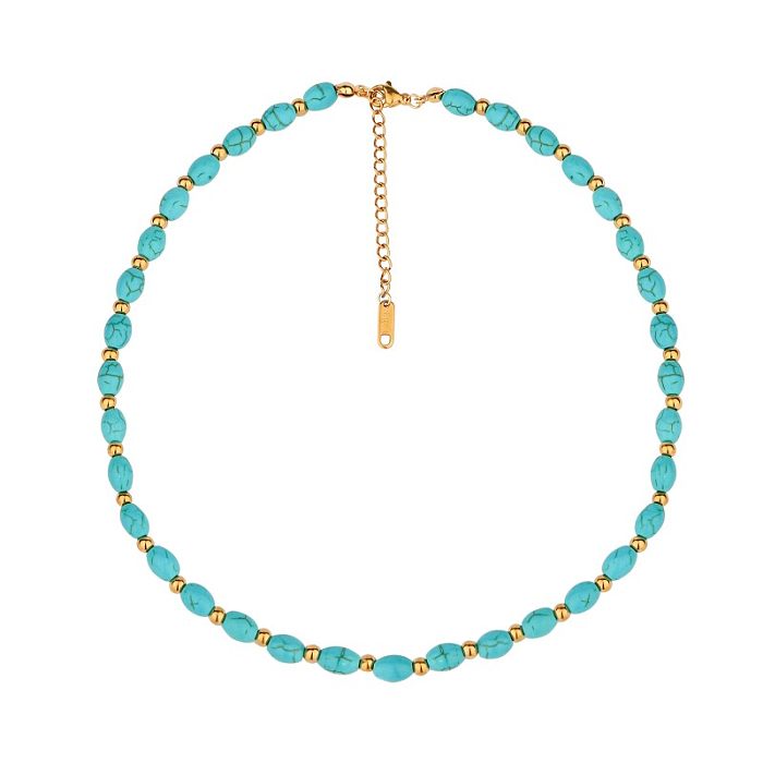 Glamouröse, quadratische Lightning-Halskette aus Edelstahl mit Perlenbeschichtung und Türkis-vergoldeten Ringen, Ohrringen und Halskette