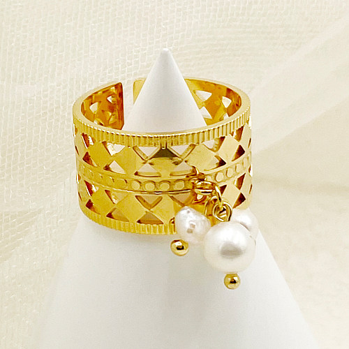 O chapeamento de aço inoxidável redondo do estilo simples escava anéis abertos banhados a ouro