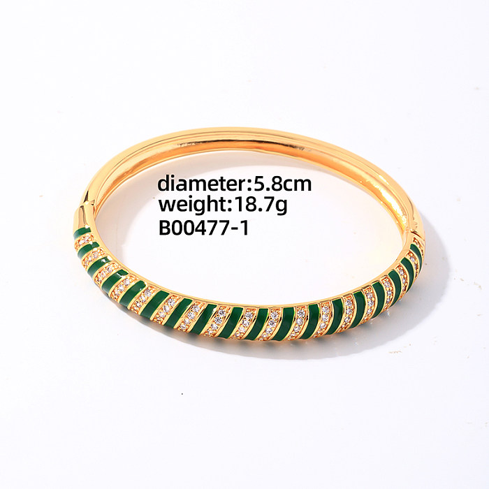 Pulseras de anillos chapados en oro con incrustaciones de esmalte de cobre y rayas en espiral redondas geométricas para mujer elegantes