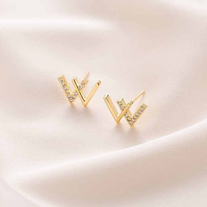 1 paire de clous d'oreilles plaqués or 18 carats, Style Simple, incrustation de lettres en cuivre et Zircon