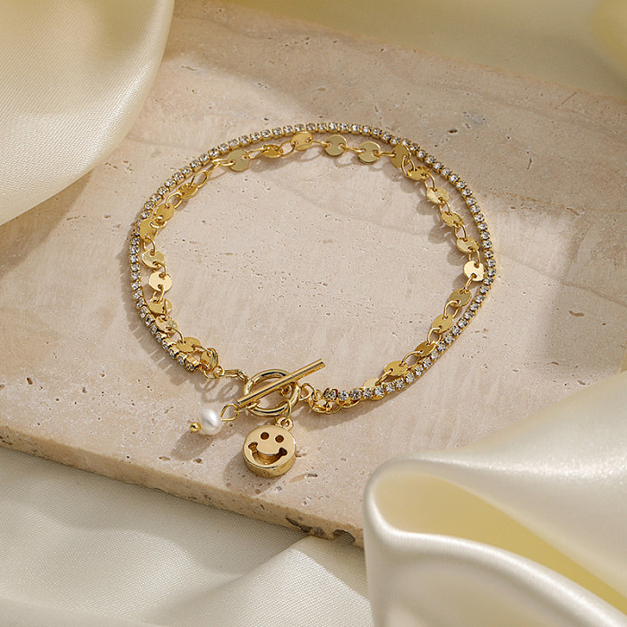Pulseras chapadas en plata chapadas en oro de 18K con incrustaciones de cobre y perlas de agua dulce con cara sonriente redonda de viaje Retro
