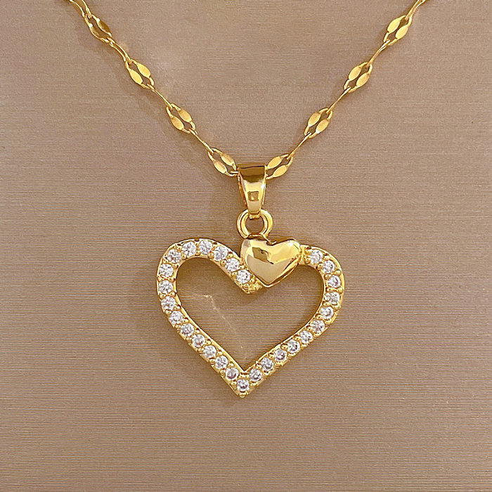 Collier pendentif en forme de cœur, titane, acier, cuivre, incrustation de Zircon, à la mode