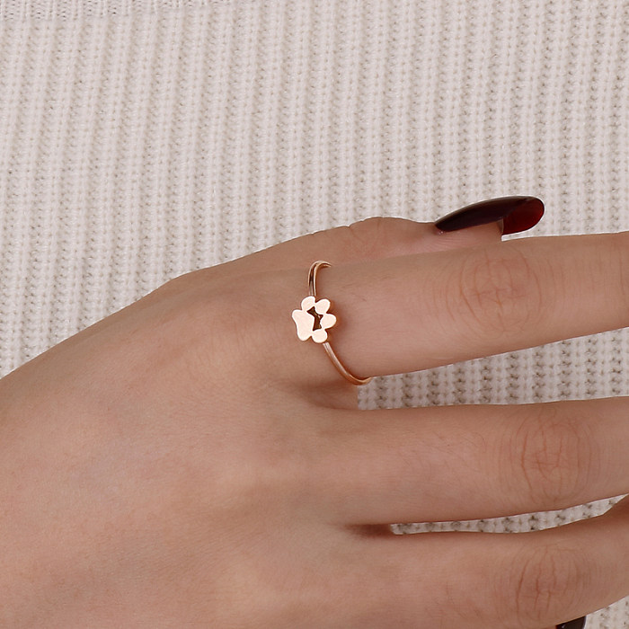 Style simple empreinte de patte couleur unie acier inoxydable polissage anneaux plaqués or 1 pièce