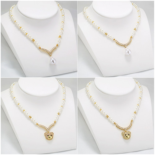 Colar com pingente banhado a ouro 18K, casual, elegante, estilo simples, forma de V, pequeno urso, imitação de pérola, cobre, incrustação de zircônia