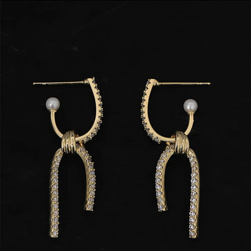1 paire de boucles d'oreilles élégantes avec nœud papillon, incrustation de cuivre, perles artificielles, Zircon