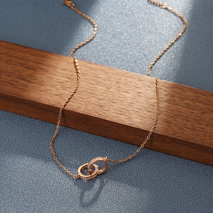 Estilo moderno estilo clássico redondo titânio aço cobre 18K banhado a ouro colar com pingente de zircão a granel