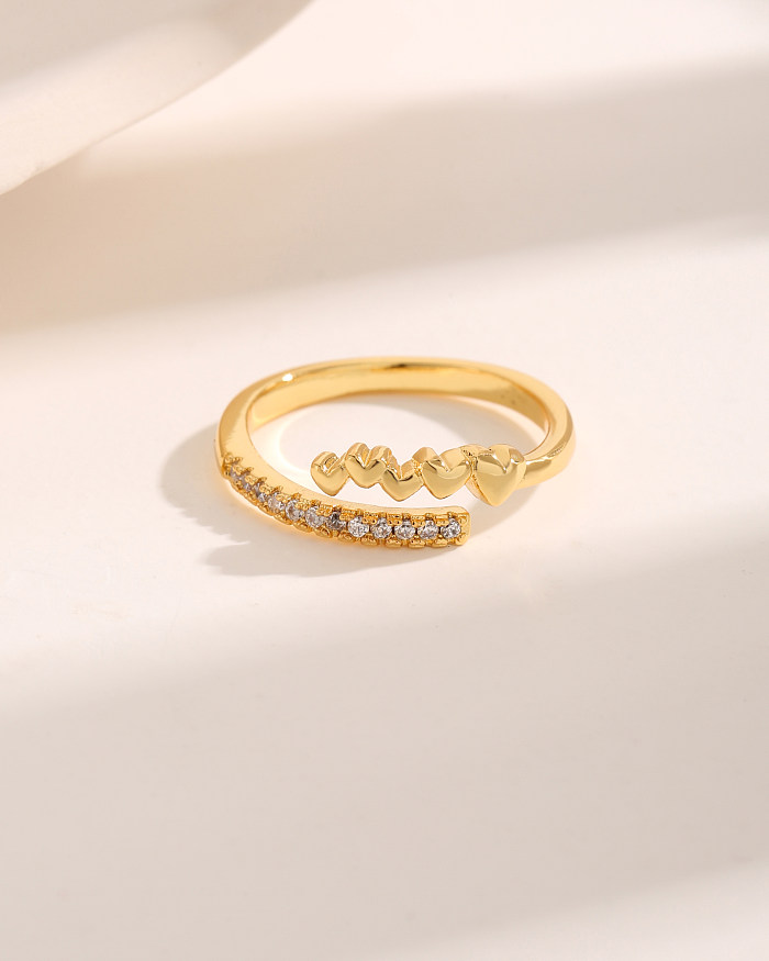 Offene Ringe im einfachen, süßen, schlichten Stil in Herzform, Kupfer mit überkreuzter Beschichtung und Inlay aus Zirkon, 18 Karat vergoldet