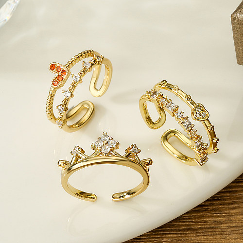Eleganter offener Ring in Herzform mit Krone, Kupferbeschichtung, Inlay aus Zirkon und 18 Karat Gold