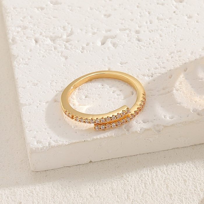 Elegante, luxuriöse, einfarbige Kupferplattierungs-Inlay-Zirkon-Ringe mit 14-Karat-Vergoldung