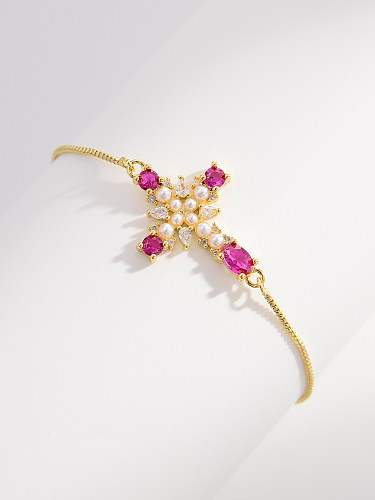 Elegante Kreuzverkupferungs-Inlay-künstliche Perlen-Zirkon-vergoldete Armbänder