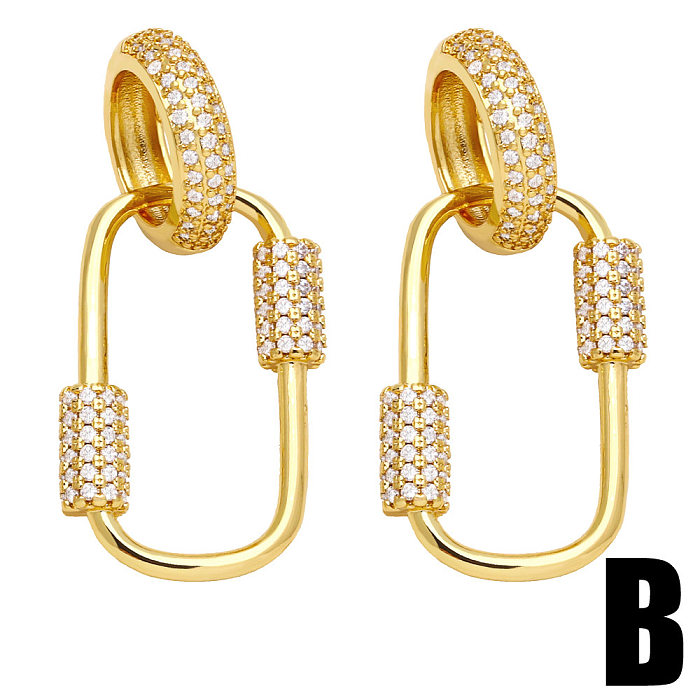 Nouveau Boucles d'oreilles géométriques ovales en cuivre plaqué or, incrustées