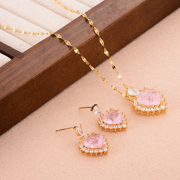 Conjunto de joyería y collar con pendientes chapados en oro con incrustaciones de cobre y forma de corazón dulce estilo IG