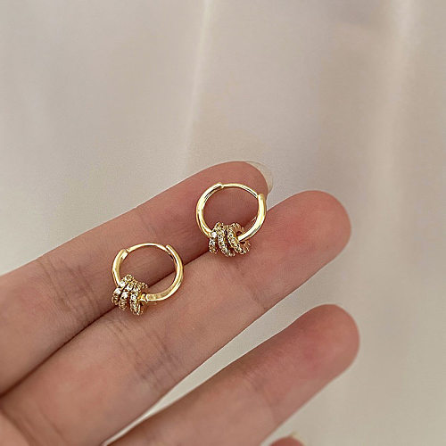 1 paire de boucles d'oreilles plaquées or et Zircon avec incrustation de cuivre géométrique de Style Simple