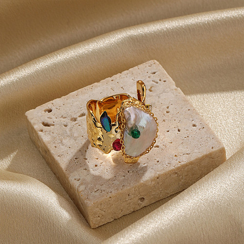 Offene Ringe mit glänzender, unregelmäßiger Verkupferung, Inlay, Perle und Zirkon, 18 Karat vergoldet