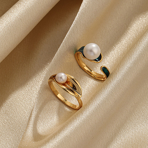 Bagues ouvertes plaquées or 18 carats avec incrustation de cuivre en forme de C de style simple rétro avec perles artificielles