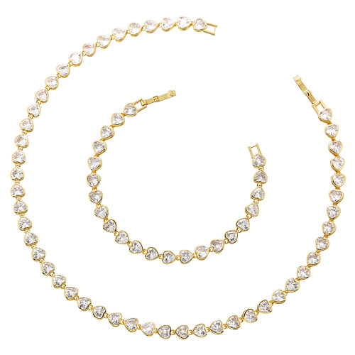 Elegante, glamouröse, herzförmige Halskette mit Intarsien aus Zirkon und 18 Karat vergoldetem Armband mit Messingbeschichtung