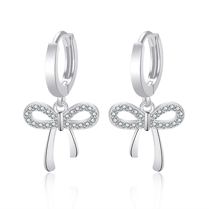 1 paire de boucles d'oreilles pendantes avec nœud papillon de Style Simple, placage de cuivre, incrustation de strass