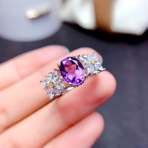 Luxuriöser offener Ring aus Kupfer mit ovaler Blume und künstlichem Kristall in großen Mengen