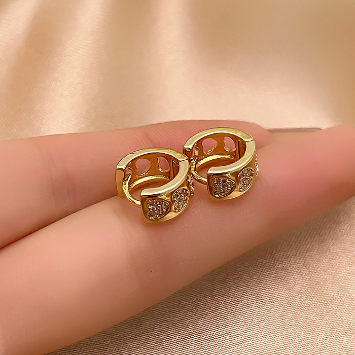1 Paar lässige, schlichte, glänzende, runde, vergoldete Ohrringe mit Inlay aus Kupfer und Zirkon