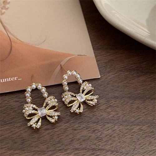 1 Pair Elegant Lady Bow Knot Inlay Copper Zircon Earrings