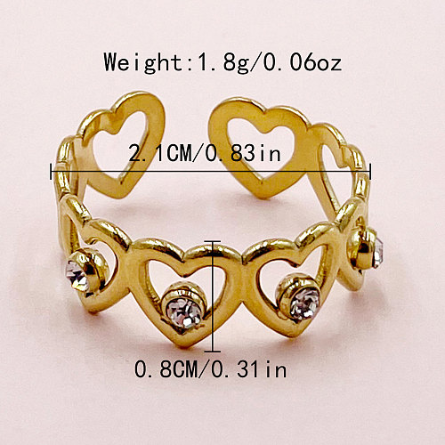 Anillos chapados en oro de diamantes de imitación con incrustaciones de revestimiento de acero inoxidable en forma de corazón de estilo simple