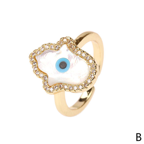 Moda europeia e americana olho do diabo zircão cobre criativo anel de concha joias atacado