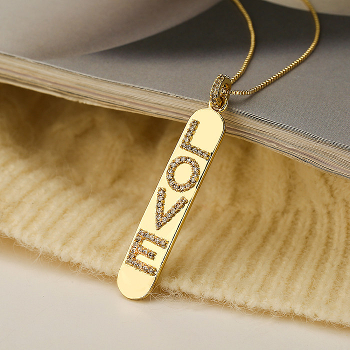Collier pendentif plaqué or 18 carats avec incrustation de cuivre et croix d'amour brillante