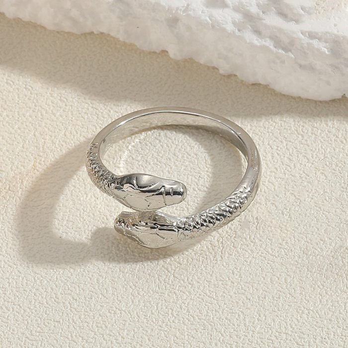 Elegante, klassische, geometrische Schlangen-Verkupferungs-Inlay-Zirkon-offene Ringe mit 14-Karat-Vergoldung