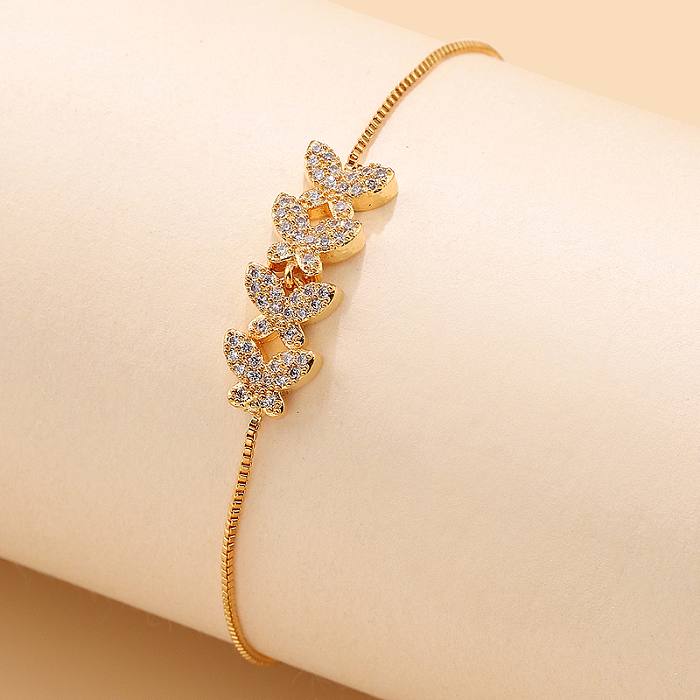 Bracelets plaqués or 18 carats avec incrustation de cuivre et papillon de fleur brillante de style simple