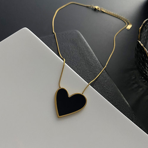 Collar de pendientes de vidrio con incrustaciones de acero titanio en forma de corazón de estilo simple