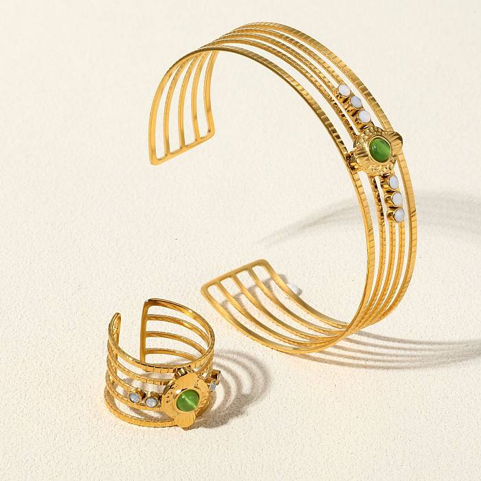 Pulseras de anillos chapadas en oro turquesa con incrustaciones de acero de titanio de color sólido de estilo simple