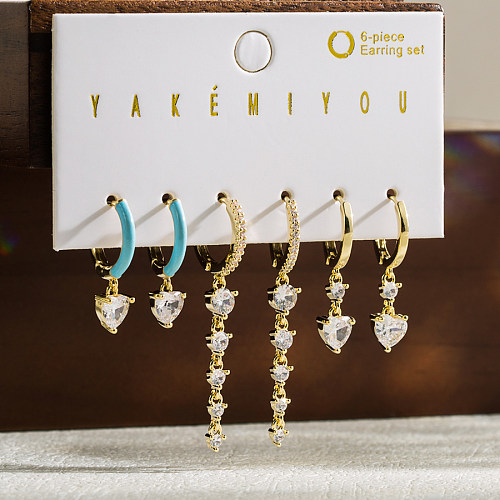 مجموعة واحدة من أقراط Yakemiyou ذات التصميم البسيط على شكل قلب دائري من النحاس والزركون المطلية بالذهب عيار 1 قيراط