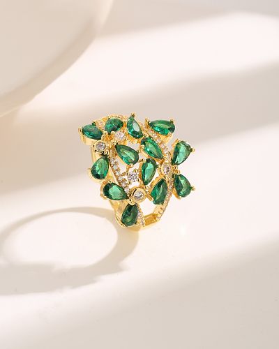 Luxuriöse Wassertropfen-Blütenblatt-Verkupferungs-Inlay-Zirkon-Ringe mit 18-Karat-Vergoldung