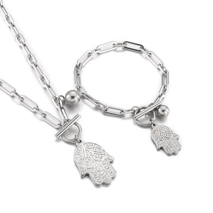 Conjunto de dos piezas de collar de pulsera de adorno en forma de palma de acero inoxidable simple de moda