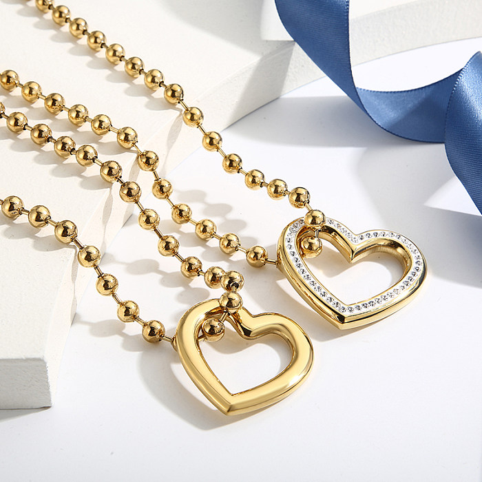 Collier de bracelets plaqué or 18K de placage d'acier inoxydable de forme de coeur de Streetwear